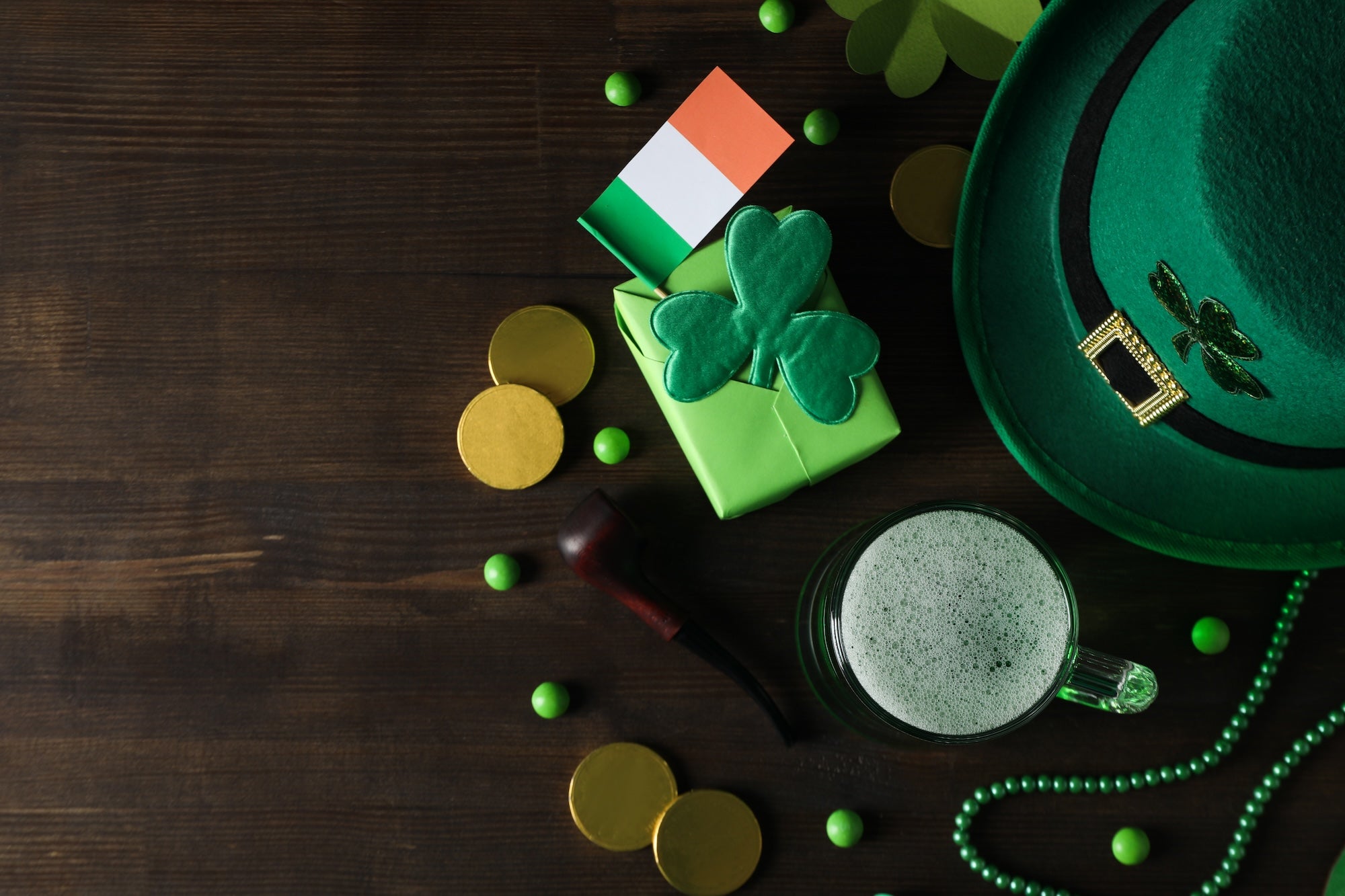 Celebrate St. Patrick's Day with these essentials like bead necklaces, hat with shamrock/clover on it or Irish flags 